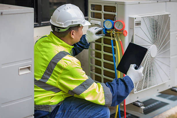 Professional Hvac technician working in De Witt, IA